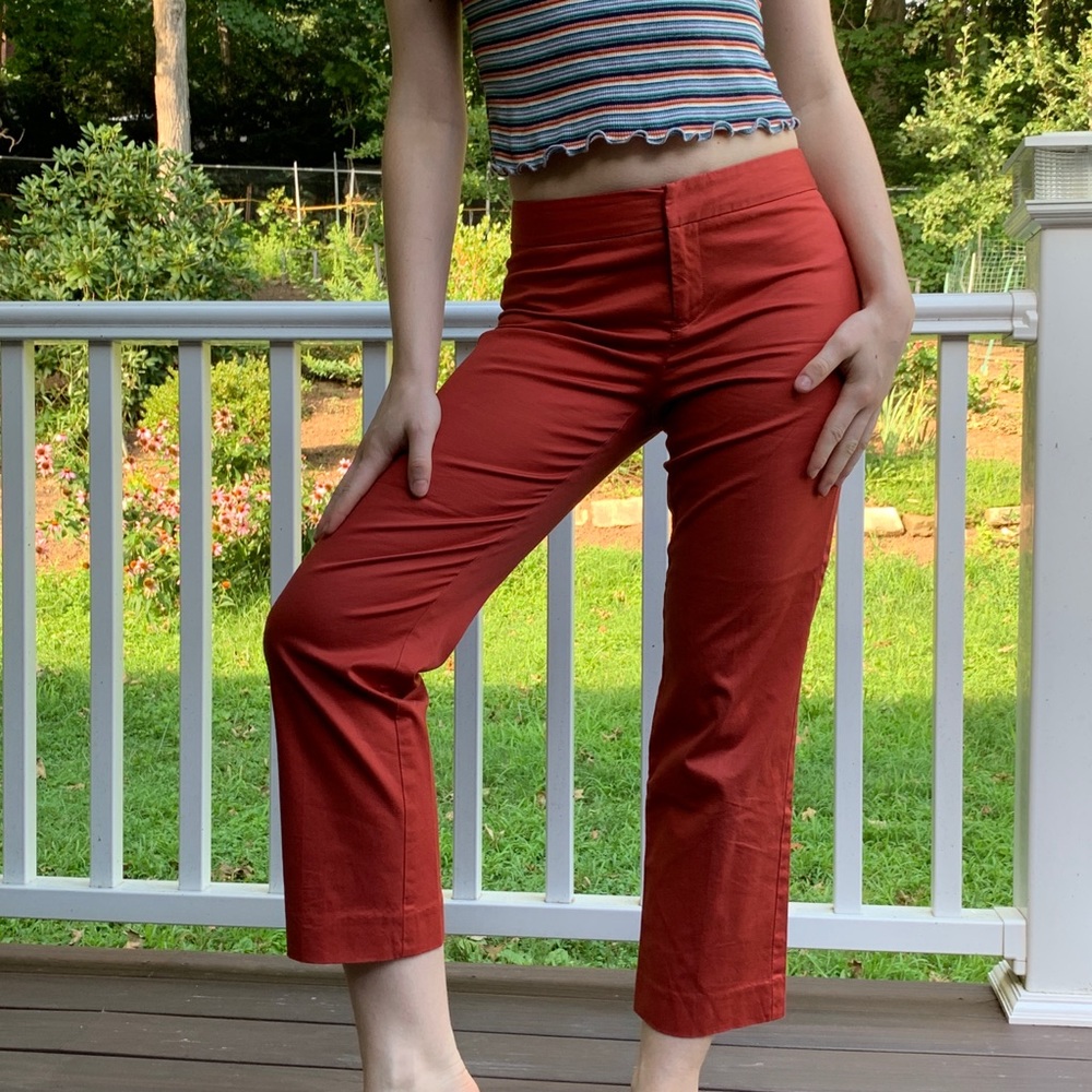 Cropped red trousers